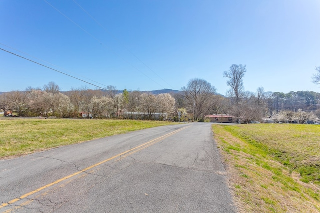 view of street featuring a rural view