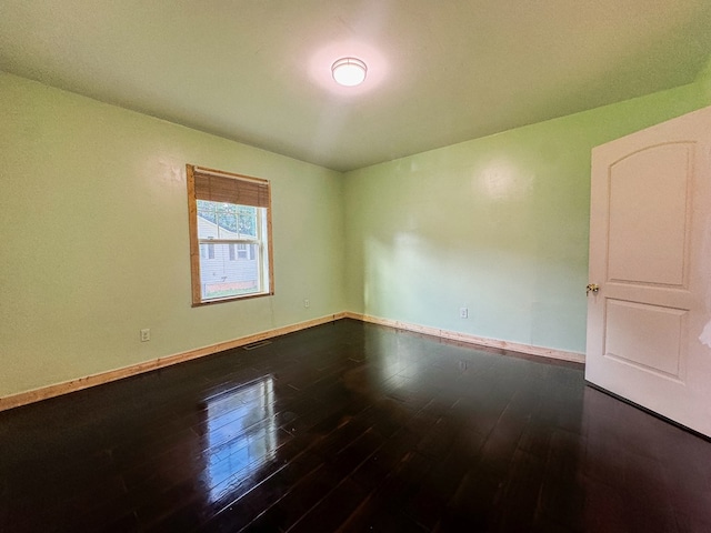 410 Anderson Ave, Dalton, GA 30721 - spare room featuring dark wood-style floors