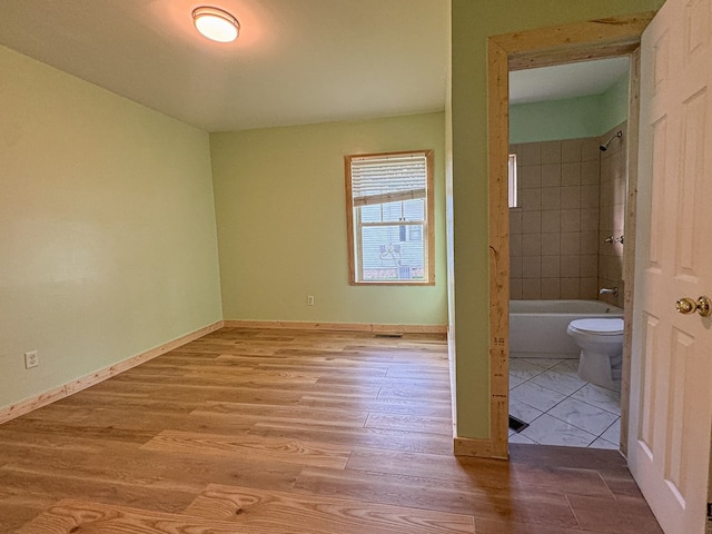 410 Anderson Ave, Dalton, GA 30721 - unfurnished room featuring wood finished floors