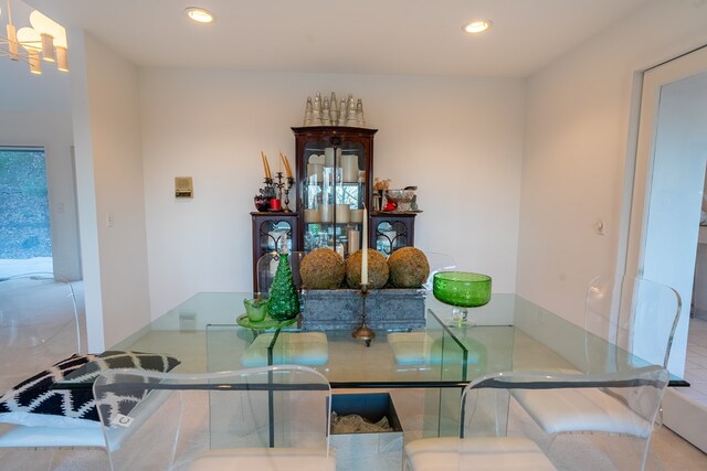 dining room featuring a chandelier