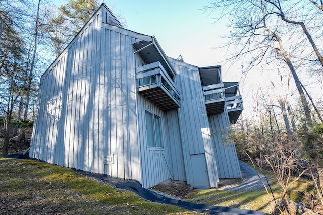 view of property exterior featuring a balcony