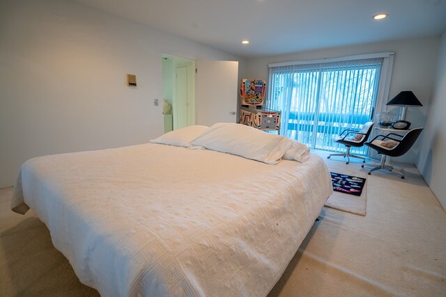 carpeted bedroom featuring access to outside