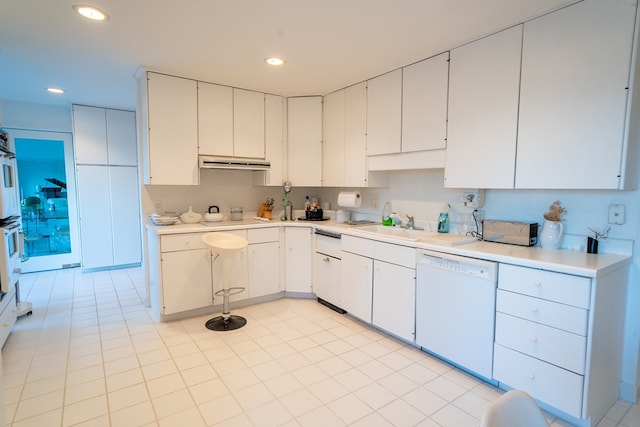 kitchen with white cabinetry, extractor fan, sink, and dishwasher