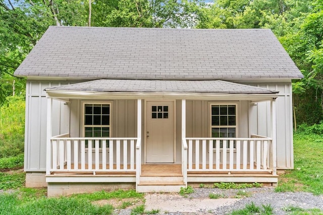 view of outbuilding with a porch