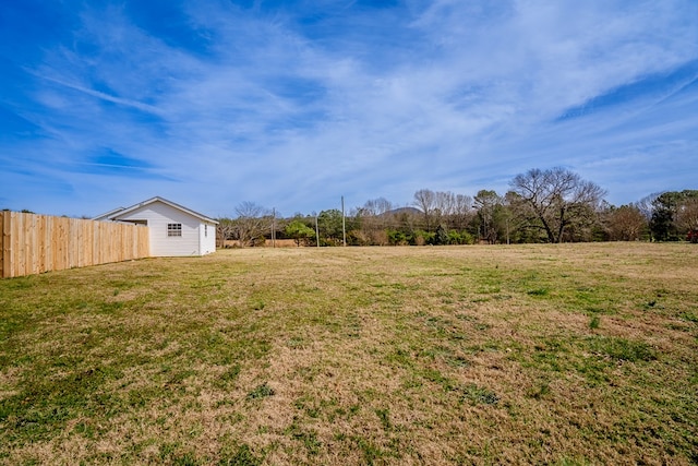 view of yard featuring fence