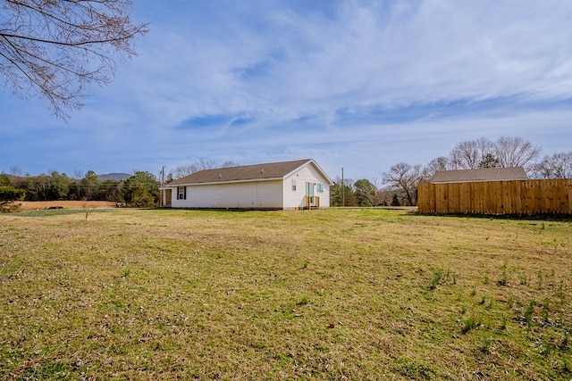 view of yard featuring fence