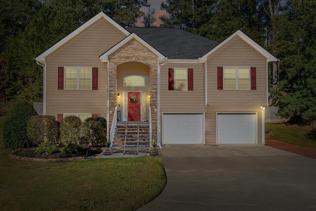 split foyer home featuring a garage