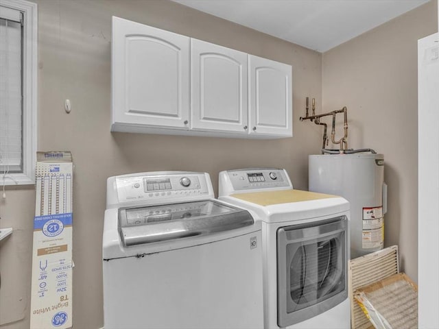 4978 Standifer Rd, Cohutta, GA 30710 - laundry room featuring cabinet space, washing machine and dryer, and water heater