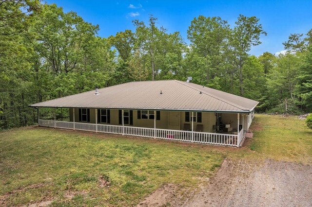 4978 Standifer Rd, Cohutta, GA 30710 - farmhouse inspired home with a front yard, driveway, metal roof, and a porch