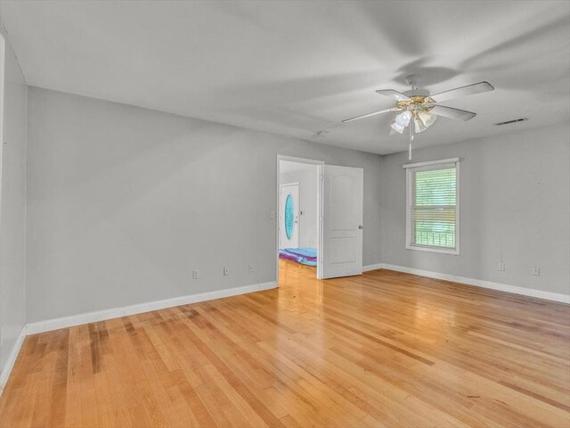 4978 Standifer Rd, Cohutta, GA 30710 - unfurnished room featuring light wood-style floors, ceiling fan, and baseboards