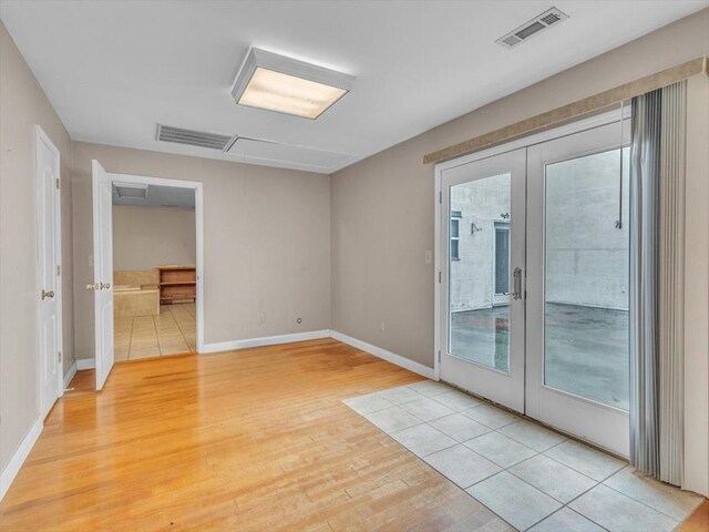 4978 Standifer Rd, Cohutta, GA 30710 - unfurnished room with french doors, light wood-type flooring, and baseboards