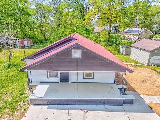 210 Grimes St, Dalton, GA 30721 - exterior space featuring an outbuilding and a storage shed