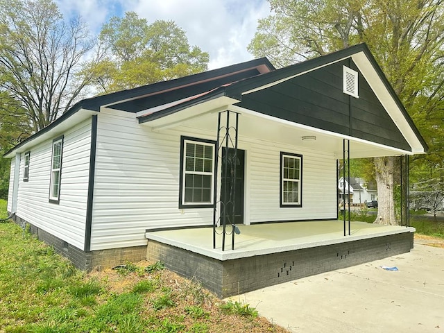 210 Grimes St, Dalton, GA 30721 - view of property exterior with a porch and crawl space