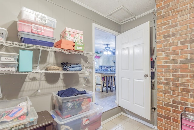 storage room featuring attic access