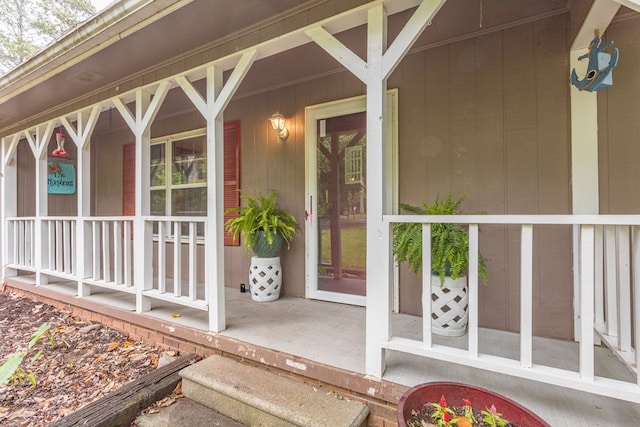 property entrance with covered porch