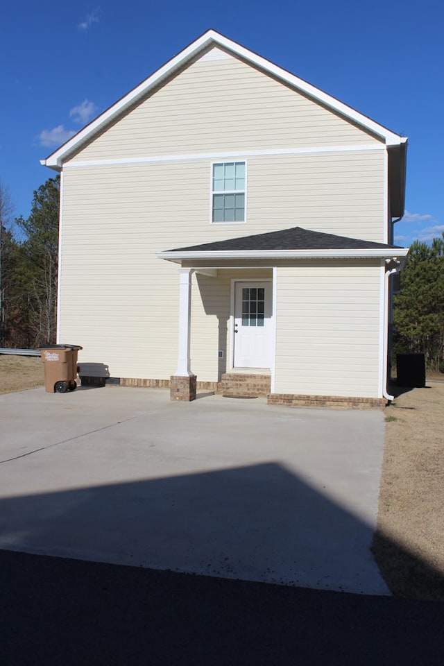 view of property exterior with a porch