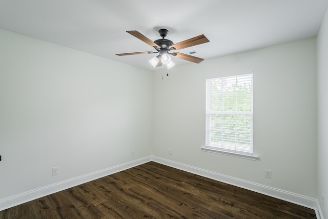 111 Arthur St, Dalton, GA 30721 - spare room with baseboards, dark wood-style flooring, and ceiling fan
