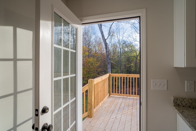 doorway with light hardwood / wood-style floors