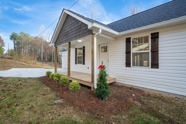 view of home's exterior with covered porch