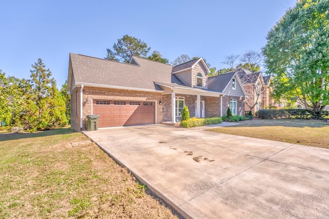 new england style home with a garage and a front lawn