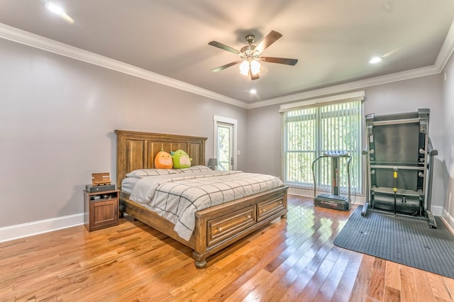 bedroom featuring ornamental molding, ceiling fan, and light wood-type flooring