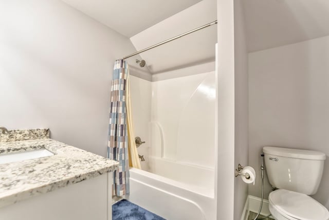 full bathroom featuring toilet, vanity, and shower / bathtub combination with curtain