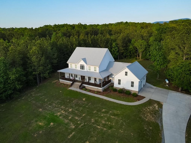 drone / aerial view with a forest view