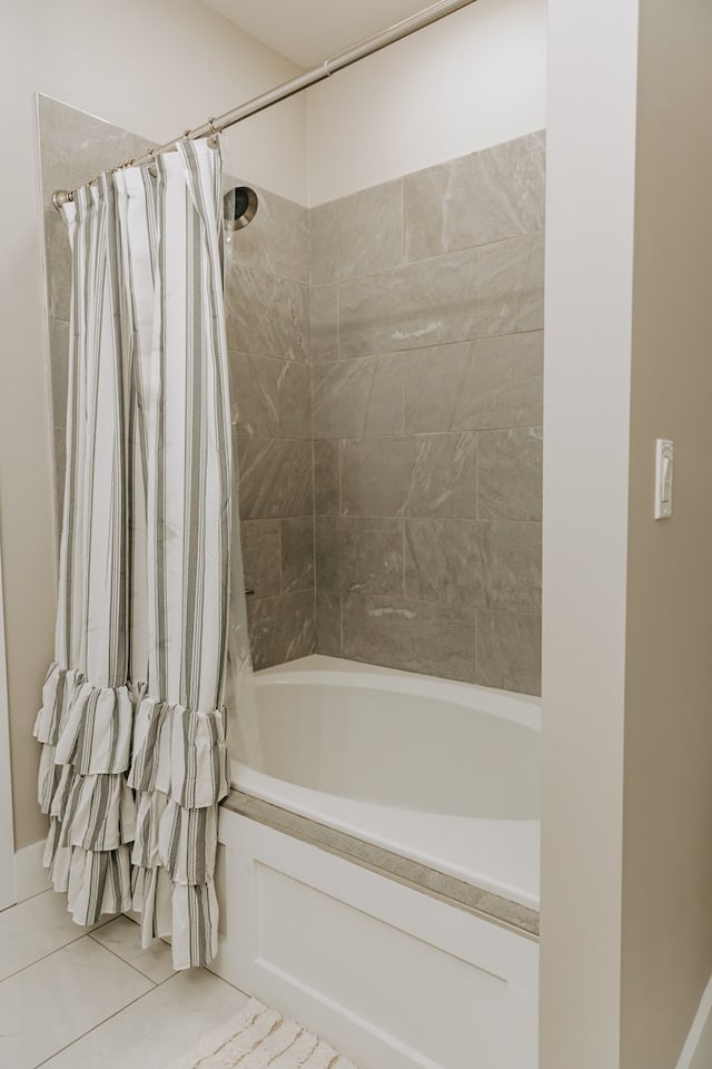 full bathroom featuring tile patterned flooring and shower / bath combo