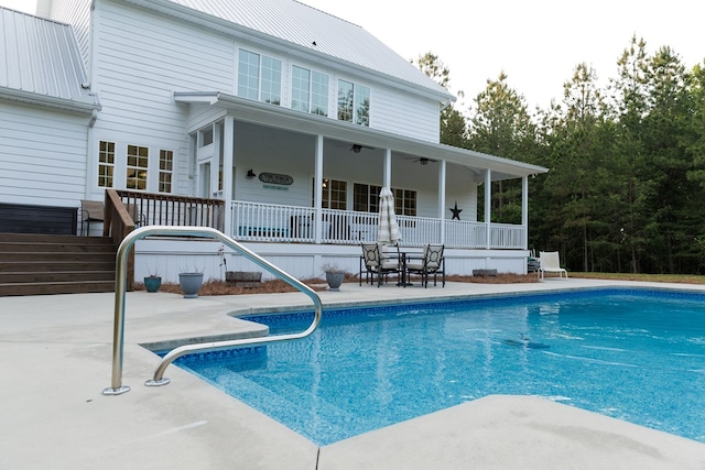view of pool featuring a patio area and a fenced in pool