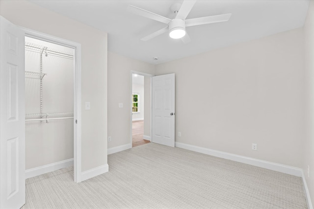 500 Woodland Dr, Dalton, GA 30721 - unfurnished bedroom featuring carpet, a closet, and ceiling fan