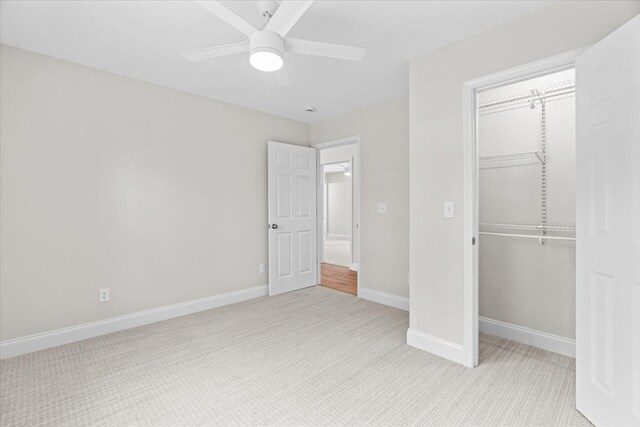 500 Woodland Dr, Dalton, GA 30721 - unfurnished bedroom with a closet, light colored carpet, and ceiling fan