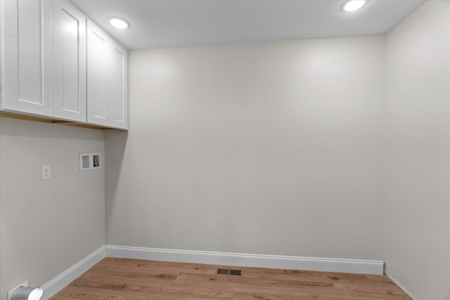500 Woodland Dr, Dalton, GA 30721 - washroom featuring cabinet space, light wood-style floors, recessed lighting, and hookup for a washing machine