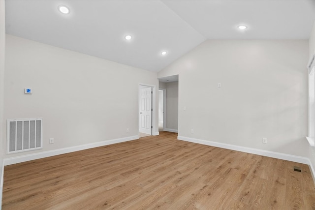 500 Woodland Dr, Dalton, GA 30721 - spare room featuring light wood finished floors, vaulted ceiling, and recessed lighting