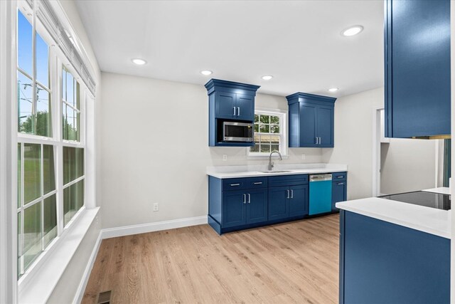 500 Woodland Dr, Dalton, GA 30721 - kitchen featuring dishwashing machine, stainless steel microwave, blue cabinetry, light wood-type flooring, and recessed lighting