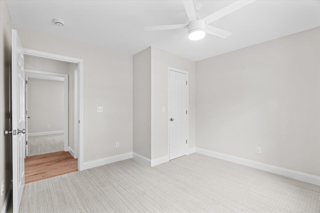 500 Woodland Dr, Dalton, GA 30721 - unfurnished bedroom featuring light colored carpet and ceiling fan