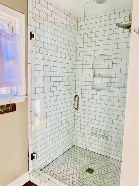 bathroom with walk in shower