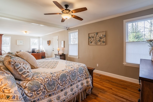 816 Dogwood Ln, Dalton, GA 30720 - bedroom featuring hardwood / wood-style floors, baseboards, ornamental molding, an office area, and a ceiling fan