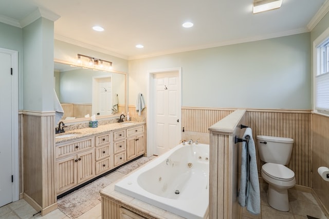 bathroom with tile patterned flooring, vanity, ornamental molding, a tub to relax in, and toilet