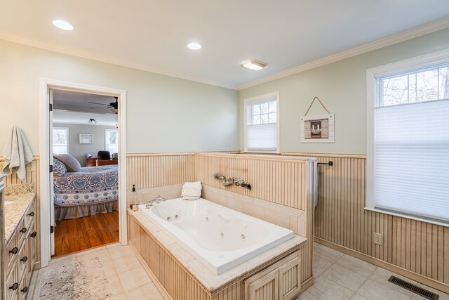 816 Dogwood Ln, Dalton, GA 30720 - ensuite bathroom with wainscoting, a whirlpool tub, ornamental molding, ceiling fan, and tile patterned floors