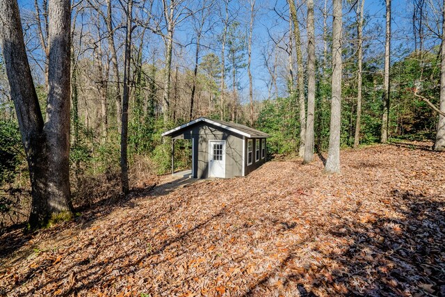 816 Dogwood Ln, Dalton, GA 30720 - view of outbuilding with an outdoor structure and a view of trees