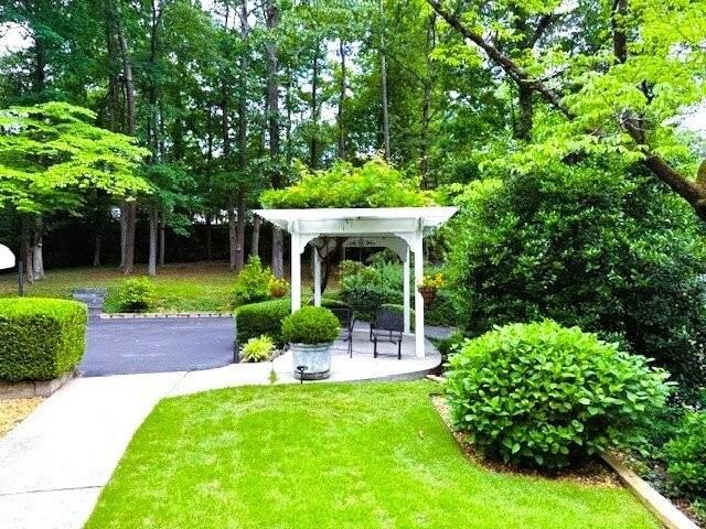 816 Dogwood Ln, Dalton, GA 30720 - view of property's community with a pergola and a yard