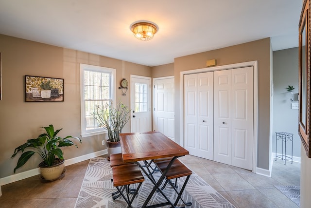 home office with light tile patterned floors