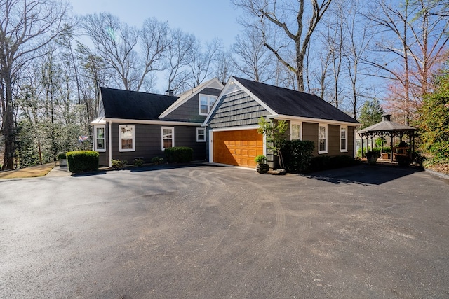 view of front of property with a gazebo and a garage