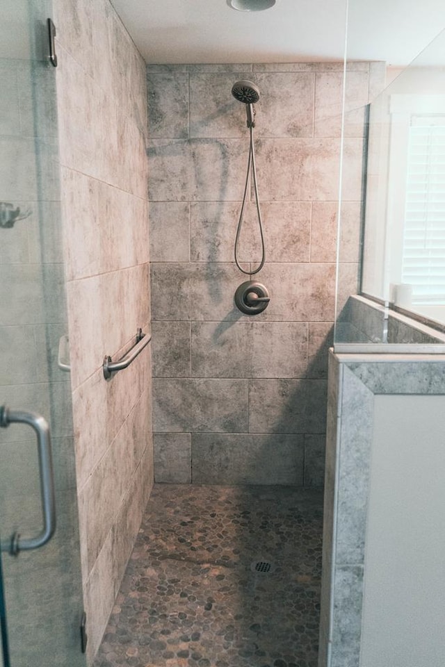 full bathroom featuring a stall shower