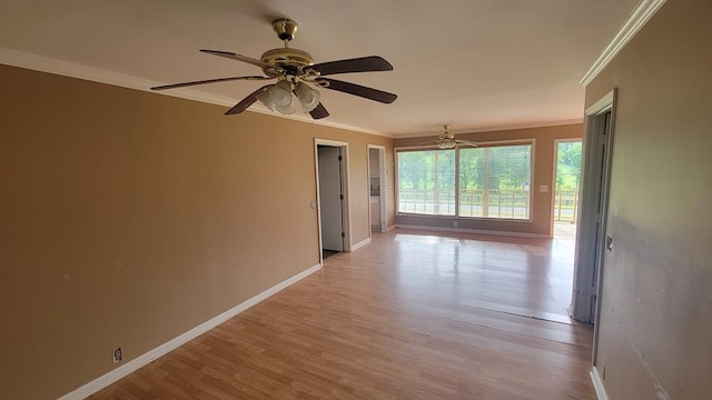 2517 Utility Rd, Rocky Face, GA 30740 - empty room featuring ornamental molding, light wood-type flooring, baseboards, and ceiling fan
