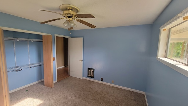 2517 Utility Rd, Rocky Face, GA 30740 - unfurnished bedroom featuring carpet flooring, baseboards, a closet, and a ceiling fan