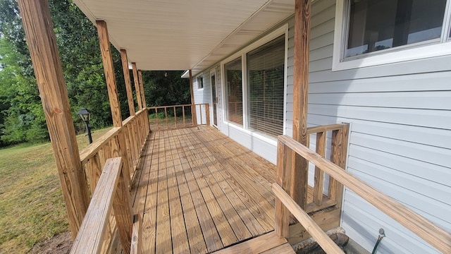 2517 Utility Rd, Rocky Face, GA 30740 - wooden deck with covered porch and a yard