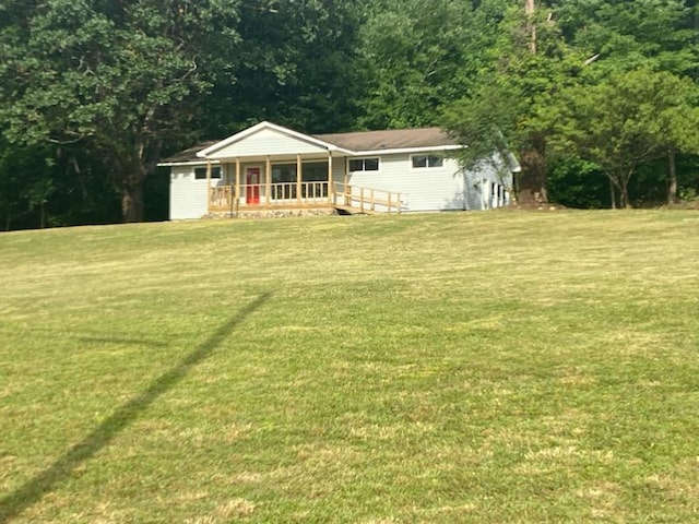 2517 Utility Rd, Rocky Face, GA 30740 - back of house with covered porch and a yard