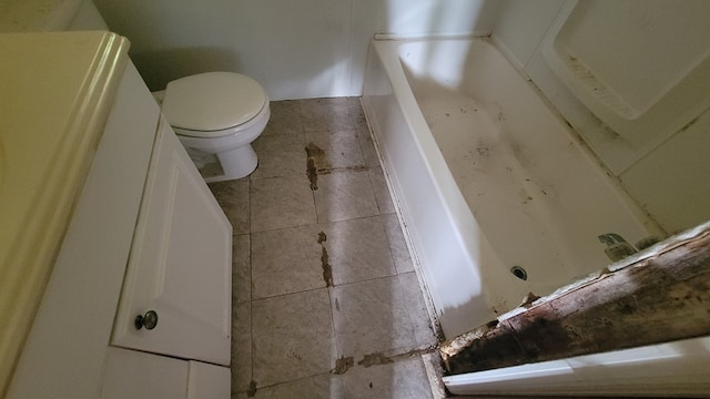 2517 Utility Rd, Rocky Face, GA 30740 - full bathroom with toilet, tile patterned floors, and a tub to relax in