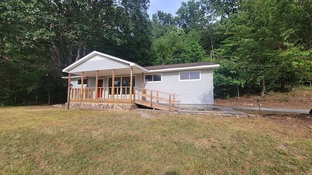 2517 Utility Rd, Rocky Face, GA 30740 - view of front of property with covered porch and a front yard